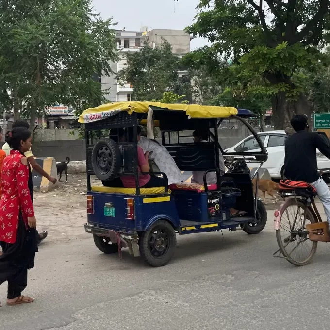 Feature image An e rickshaw accompanies daily life in South Delhi