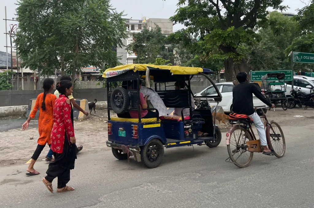 Feature image An e rickshaw accompanies daily life in South Delhi